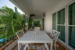Your private pool view balcony with dining area, hammock and BBQ